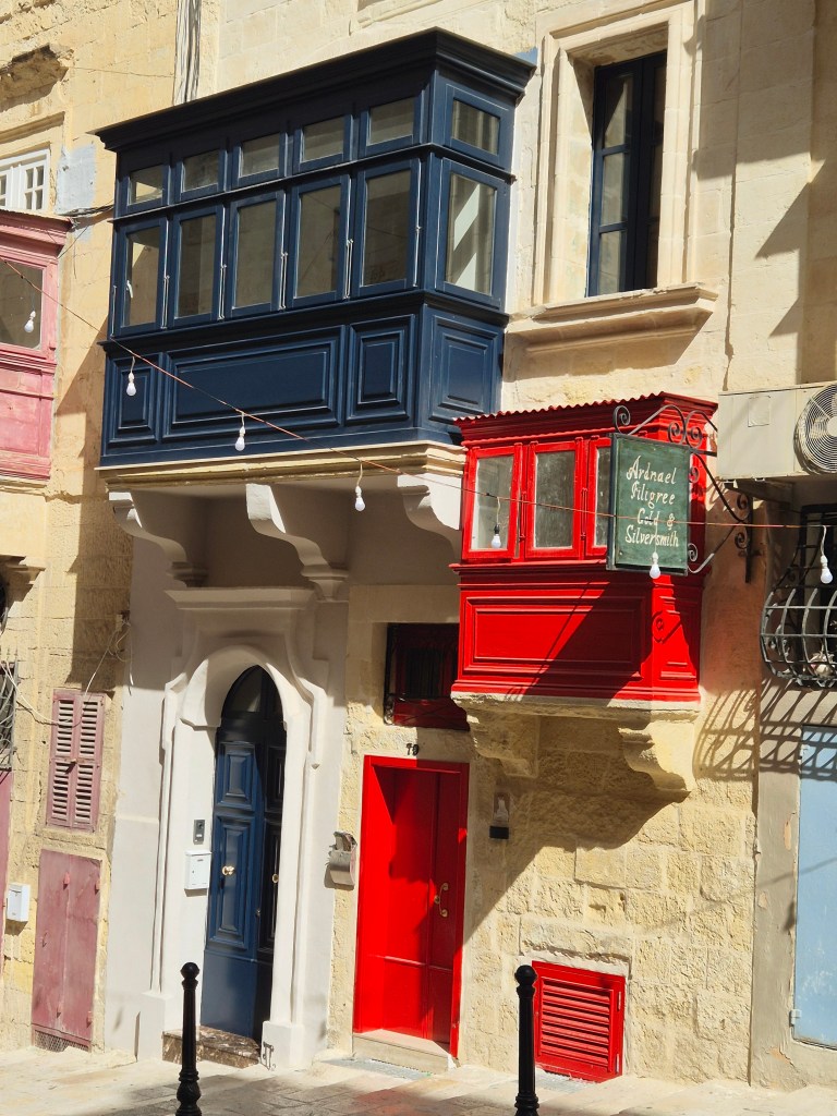Bright, Maltese windows on Republic street, Valletta.