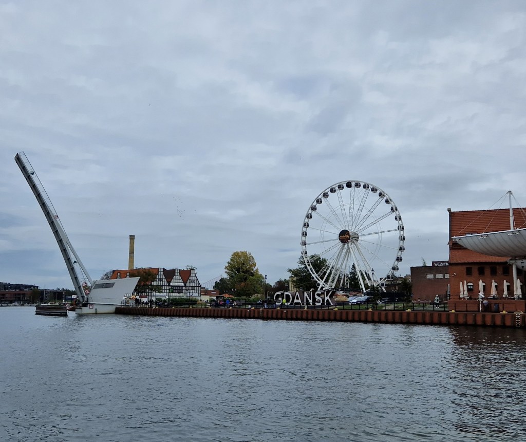 Gdansk sign across the Motlawa river