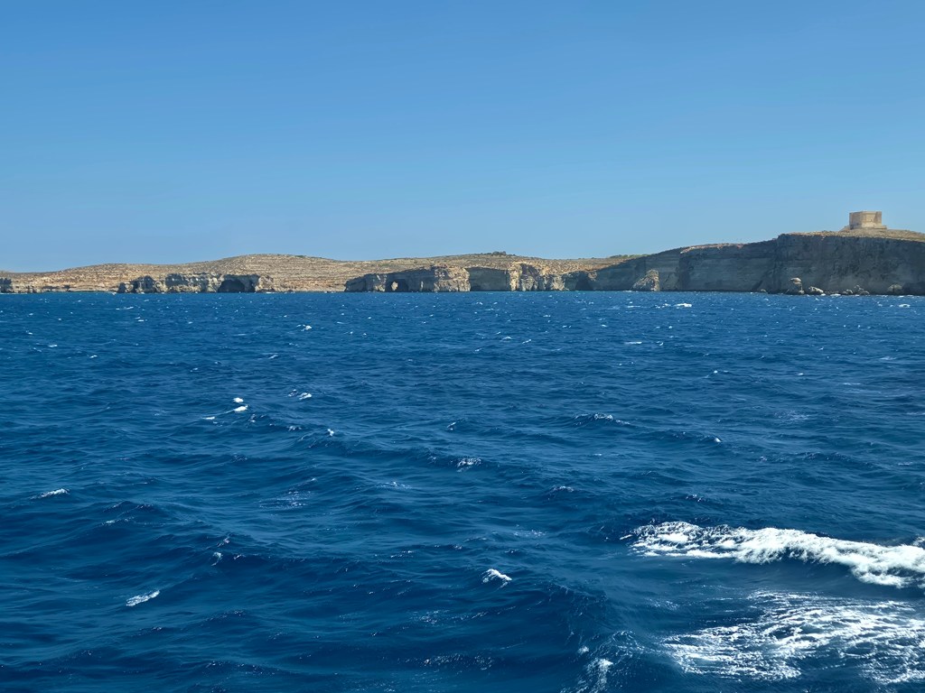 Comino island from the Gozo Channel Ferry.