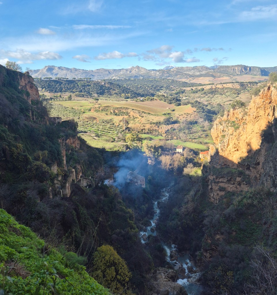Viewpoint in Ronda overlooking the El Tajo gorge. Panoramic countryside stretching far into the distance. 